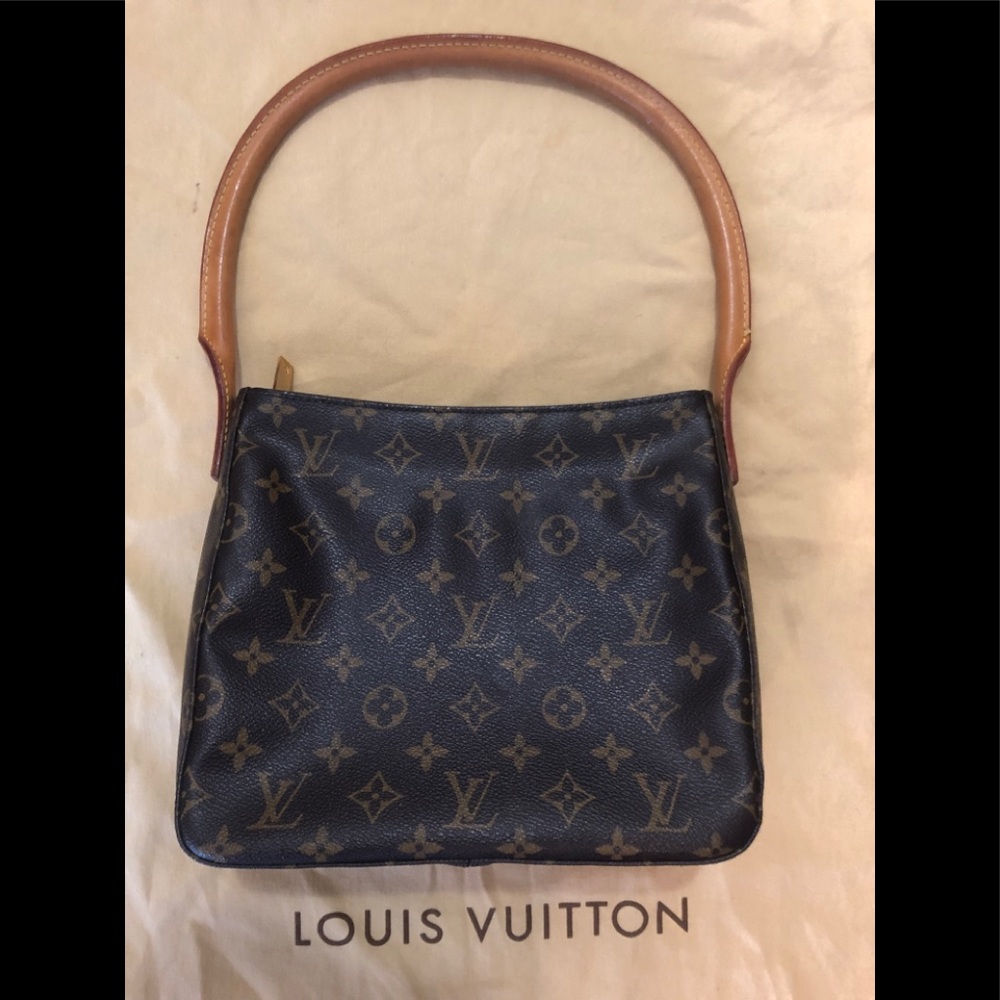 Louie Vuitton hang bag.